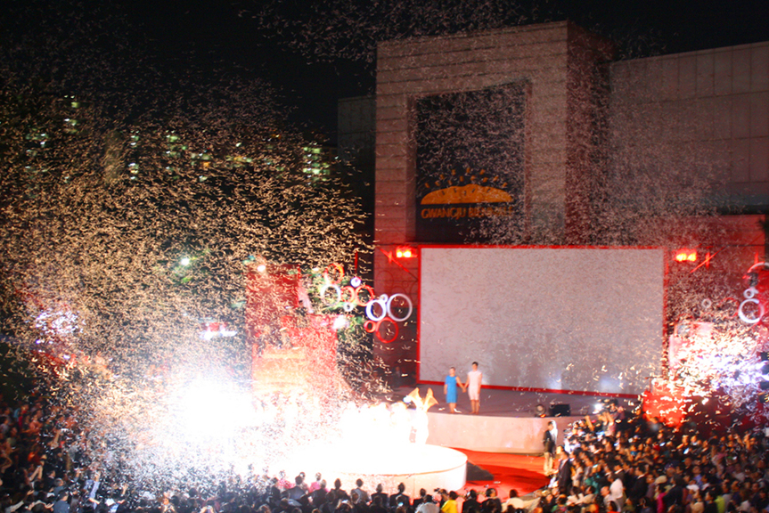 The festive and public opening ceremony was held in a packed amphitheater and featured local politicians, movie stars, a modern dance routine, musical acts and confetti.