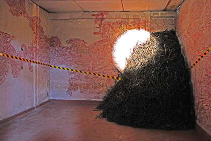 Artists such as Colombo-based PRADEEP CHANDRASIRI had several conversations with the curators over a series of six months, conceptualizing and refining their proposals. The work seen here consists of branches, charcoal and barricade tape and is called Inside the Charcoal Mountain (2015).