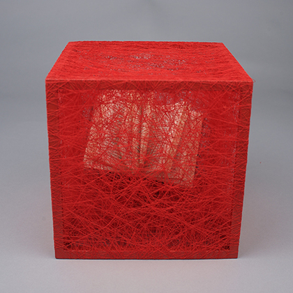 CHIHARU SHIOTA, State of Being (Book II), 2016, metal frame, vintage books and red thread, 20 × 20 × 20 cm. Courtesy the artist and Anna Schwartz Gallery, Melbourne.