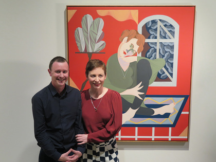 The 2017 Archibald Prize winner, MITCH CAIRNS, stands with his partner Agatha Gothe-Snape before his prize-winning painting. Photo by Michael Young for ArtAsiaPacific.