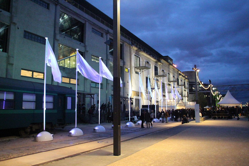 La Sucrière, a former warehouse facing the Saône and one of the Biennale’s principle venues, was festooned with MARCO GODINHO’s Untitled (Transparent Flags) #3 (2007–11).