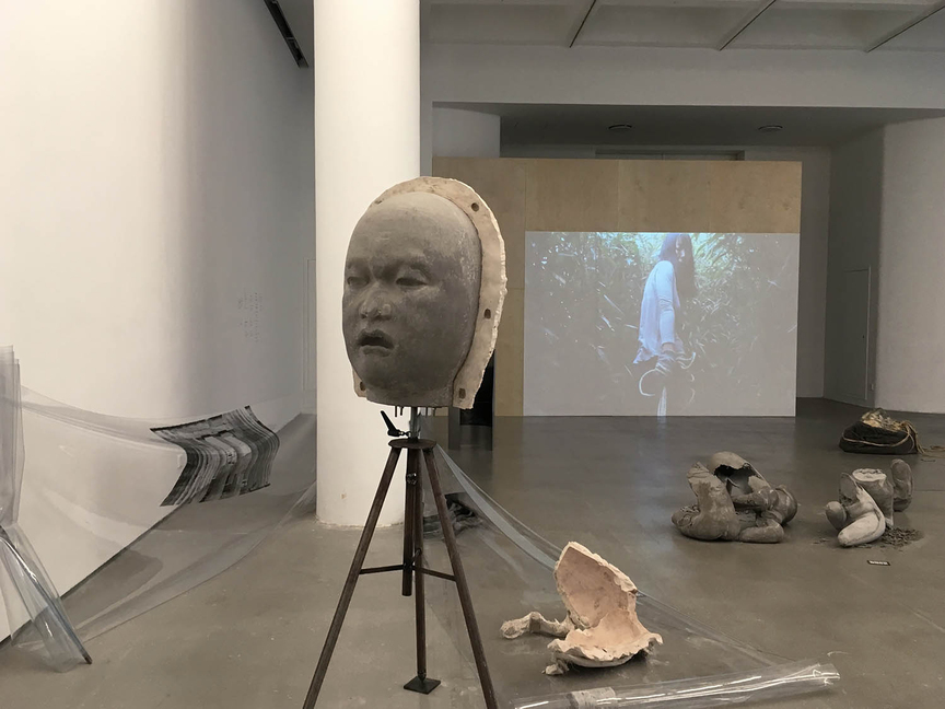 YU JI’s presentation was on the museum’s second floor. Yu’s practice is focused on the peculiarities of material and process—in particular, resin, beeswax and concrete have constantly reappeared in her renditions of the body, which often quote details from Greco-Roman sculptures. The video in the back documents the artist lugging a rock up a hill on the east coast of Taiwan.