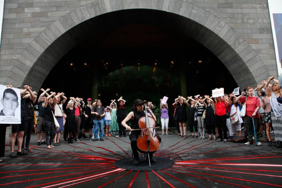 Melbourne-based Artists’ Committee staged an intervention, titled Break the Silence (2017), involving a cello performance of a piece composed by Kurdish filmmaker and former Manus Island detainee BEHROUZ BOOCHANI to protest the National Gallery of Victoria’s contract with Wilson Security. Photo by Lara Chamas. Courtesy Artists’ Committee.