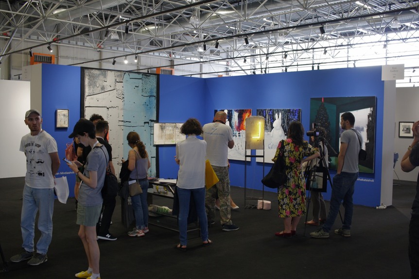 Eruti gallery’s booth at TAF, with mixed-media works by LEVAN MINDIASHVILI and paintings by TATO AKHALKATSISHVILI.