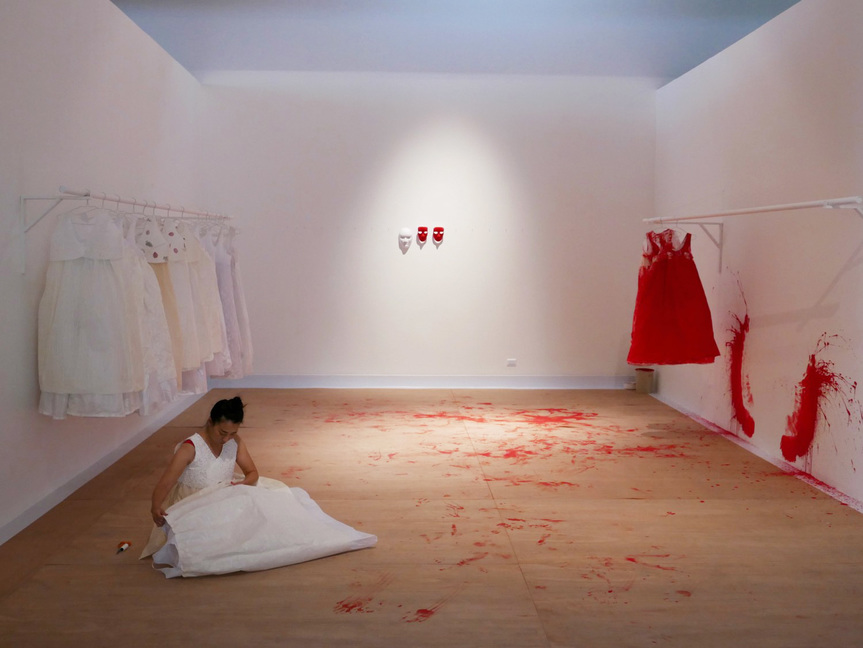 JIHYUN YOUN’s Geometry of Lamentation (2013/18) “maps the inner landscape of emotion” through repetitive gestures based on Korean (Hangeul) characters as she stitches wedding dresses that are then painted red at the end of each day.