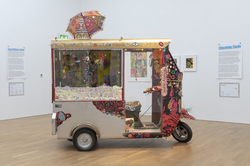 Installation view of CHILA KUMARI SINGH BURMAN’s My Valiant Queen Tuk Tuk, 2017, vehicle with mixed-media embellishments, approximately 260 × 190 × 135 cm, at “Tales of Valiant Queens,” Middlesbrough Institute of Modern Art, 2018–19. Courtesy the artist and Middlesbrough Institute of Modern Art.