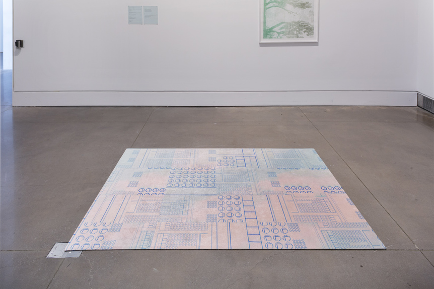 Installation view of JESSE CHUN’s Primary Language ( ), 2018, textile rug, 152.4 × 213.4 cm, two 21.6 × 27.9 cm sheets, at Queens International 2018, Queens Museum, New York, 2018–19.