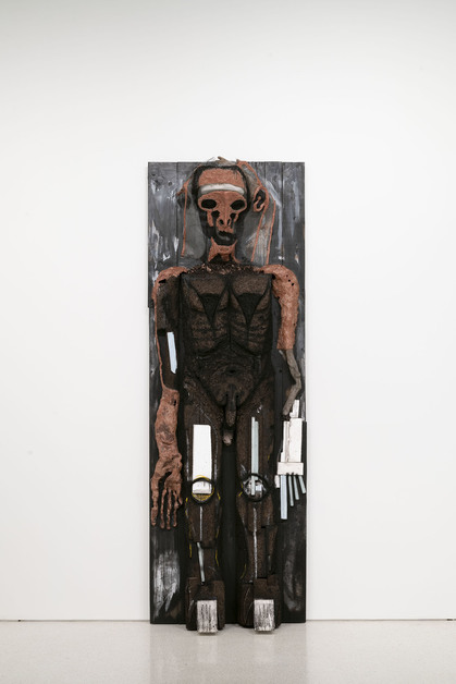 Installation view of HUMA BHABHA’s Memories of the Future, 2018, wood, wire, clay, cork, polystyrene foam, acrylic, and oil stick, 367 × 125.7 × 58.4 cm, at the 57th Carnegie International, Carnegie Museum of Art, Pittsburgh, 2018–19. Photo by Bryan Conley. Courtesy the artist and Salon 94, New York.