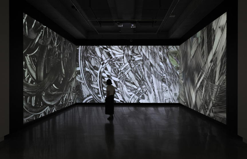 Installation view of TAKEHITO KOGANEZAWA’s Paint it black and erase, 2010, digital video: 4 hours and 44 mins, at “The Garden of Forking Paths,” Buxton Contemporary, the University of Melbourne, 2018–19. Photo by Christian Capurro. Courtesy the artist.