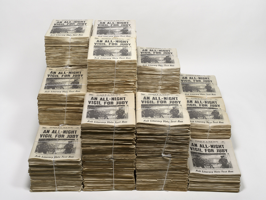 MATTHEW JONES, About 1,000 copies of The New York Daily News on the day that became the Stonewall Riot copied by hand from microfilm records, 1997, 20 bundles of web-printed newspapers tied with string: 25 × 47 × 32 cm each approx., and 75 loose web-printed newspapers: folded, 39 × 29 cm each.