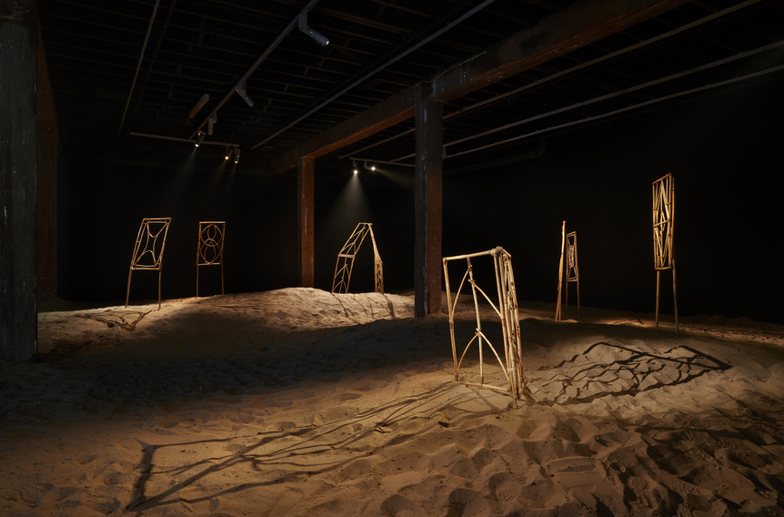 Installation view of TALOI HAVINI’s Reclamation, 2019, cane, vine, steel, varnish, site-specific installation, dimensions variable, at “Reclamation,” Artspace, Sydney, 2019–20.