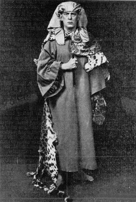 Aleister Crowley in the ceremonial costume of the Hermetic Order of the Golden Dawn, a secret society with which he was involved before developing Thelema. Public domain.