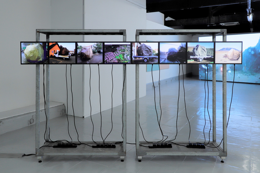 Installation view of LOUIS NIXON’s Moving Rock, 2017–20, digital video, CCTV monitors, steel, 182 × 289 × 63 cm.