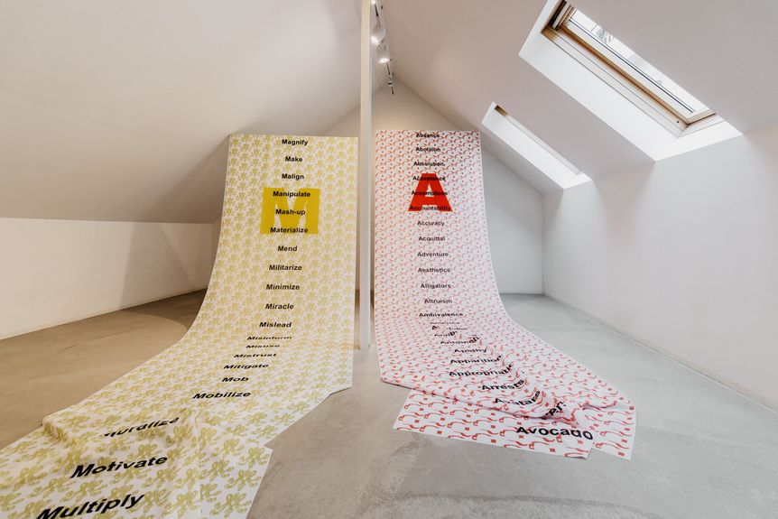 Installation view of STEPHANIE MISA’s The MAGA Alphabet, 2021, digital textile print, 140 × 500 cm each, at “MAGA meets Marie,” Gallery Gundula Gruber, Vienna, 2021.